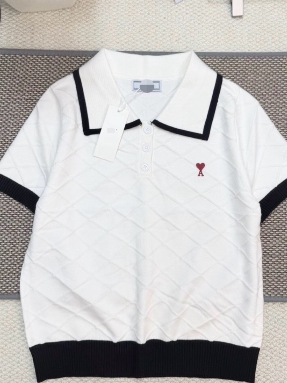 Ami White Polo with Black Trim and Red Heart Logo
